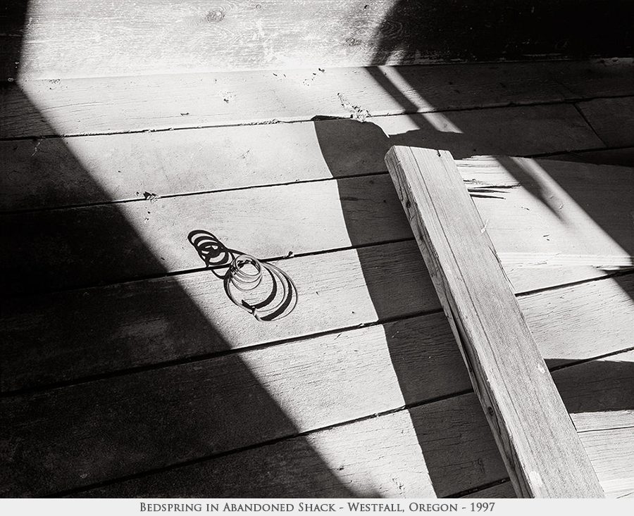 bedspring in abandoned shack